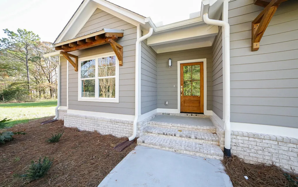 A beautifully crafted custom home exterior built by J.W. York Homes, showcasing our commitment to high-quality new construction in Athens, GA.